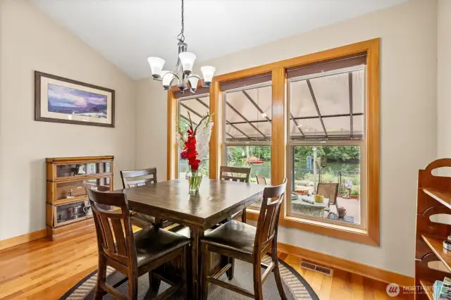 Dining room looking out your window with a river view.