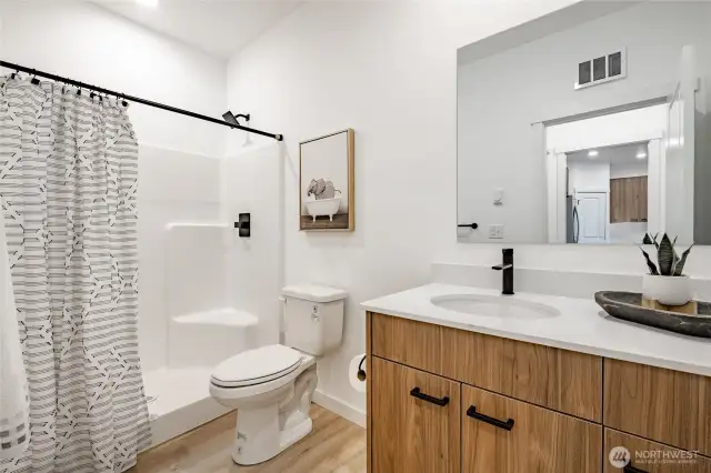 Photos shown are of a similar floor plan previously built in a different neighborhood (The Ridge in Blaine). Finishes and features may vary. Some items pictured reflect buyer-selected upgrades which are not included in the base price and may be added at an additional cost.