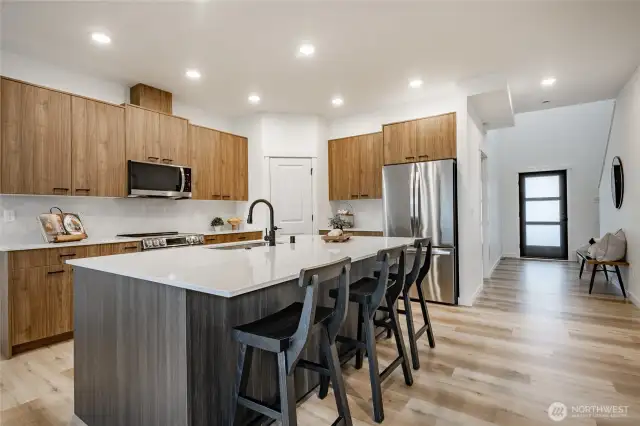 Photos shown are of a similar floor plan previously built in a different neighborhood (The Ridge in Blaine). Finishes and features may vary. Some items pictured reflect buyer-selected upgrades which are not included in the base price and may be added at an additional cost.