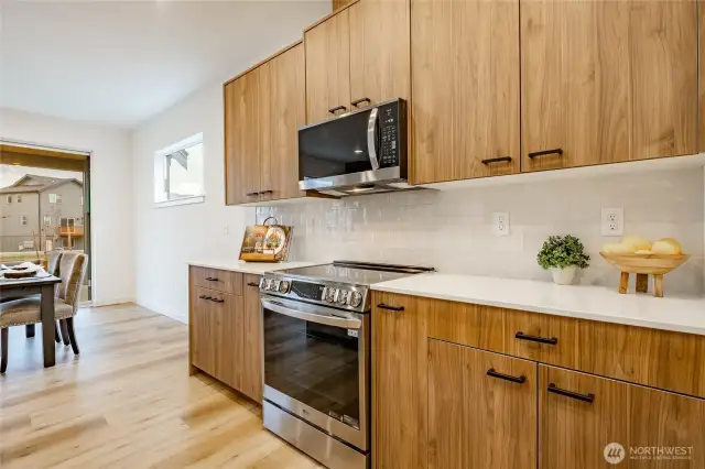 Photos shown are of a similar floor plan previously built in a different neighborhood (The Ridge in Blaine). Finishes and features may vary. Some items pictured reflect buyer-selected upgrades which are not included in the base price and may be added at an additional cost.