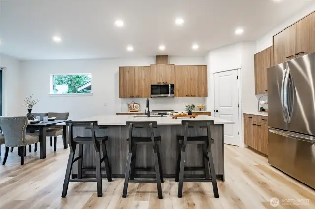 Photos shown are of a similar floor plan previously built in a different neighborhood (The Ridge in Blaine). Finishes and features may vary. Some items pictured reflect buyer-selected upgrades which are not included in the base price and may be added at an additional cost.