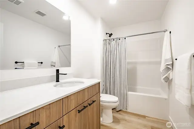 Photos shown are of a similar floor plan previously built in a different neighborhood (The Ridge in Blaine). Finishes and features may vary. Some items pictured reflect buyer-selected upgrades which are not included in the base price and may be added at an additional cost.