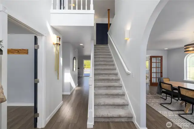 Front entry with high ceilings.
