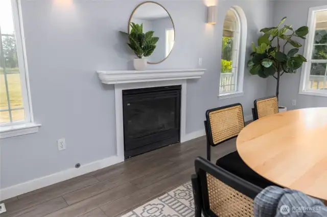 Fireplace in formal dining room.