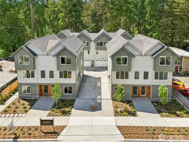 Street side units are 2 bedroom, 2.5 bath, 1318 square with 2 car EV garages. 1 rear unit left, 4 bedroom, 2.5 bath, 1830 square feet with 2 car EV ready garages