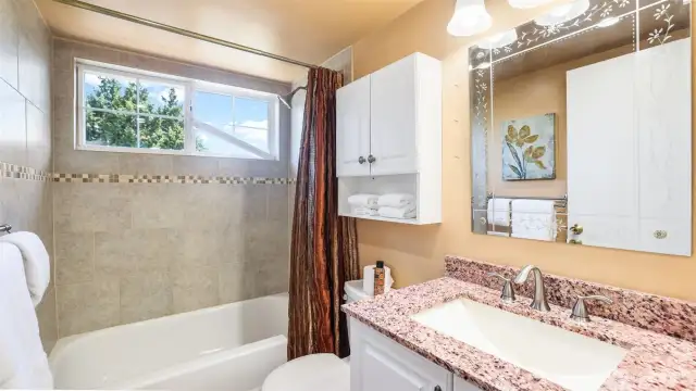 Full guest bathroom upstairs.