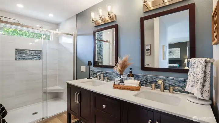 Enjoy this spa-like designed ensuite complete with glass shower and dual mirrors.