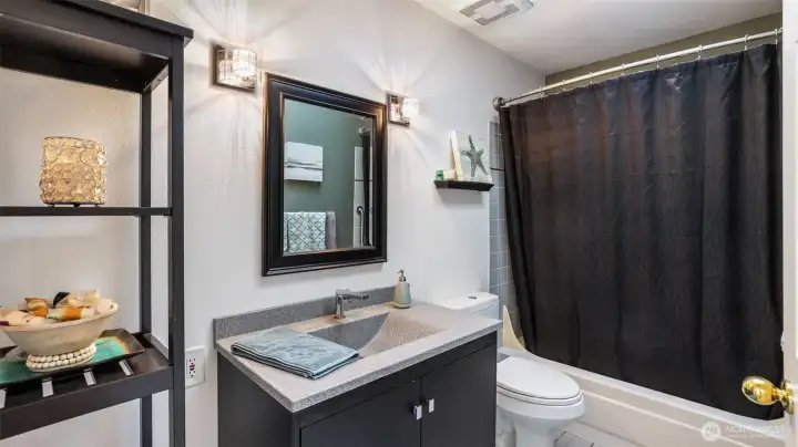 Well-appointed bathroom perfect for guests or everyday use.