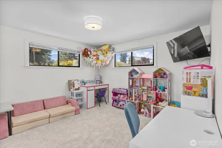 Main floor bedroom used as playroom