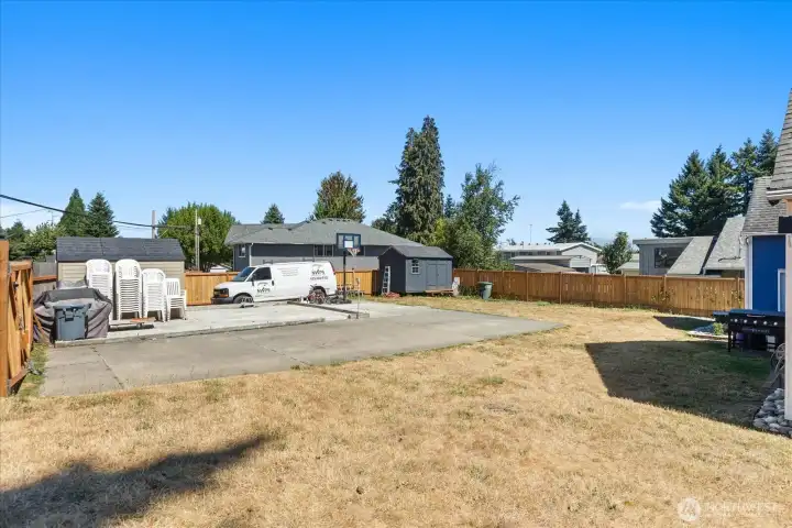 Standing in lot B (backyard of house #A) & looking towards lot C.  Lot C is about a 1/3 onto the concrete pad from lot A, so the gate will need to be adjusted if lot A isn't sold with lot C.