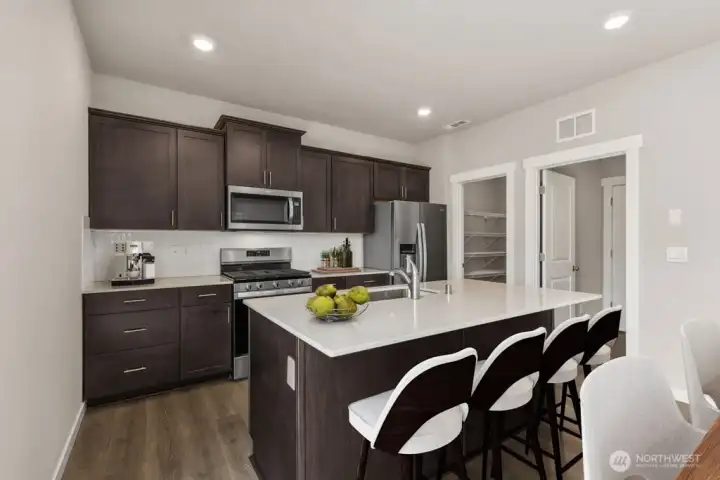 Photo is of a similar home. Colors and materials may vary.