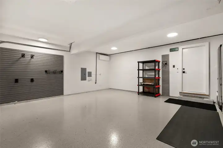 fully finished garage with storage + heating and A/C!