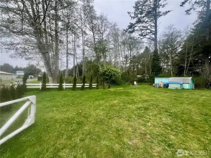 Great yard!  2nd lot adds lots of possibilities.  Big garage/shop, 2nd home...