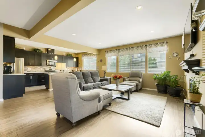 Open-concept view from the living room into the kitchen, creating a seamless flow ideal for everyday living and entertaining.