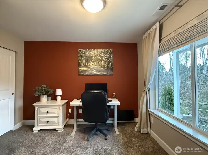 Main floor office/bedroom faces the front yard