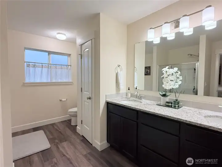 Five-piece bathroom with linen closet