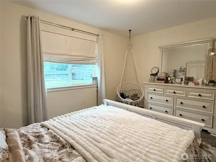 Notice custom roman shades throughout home