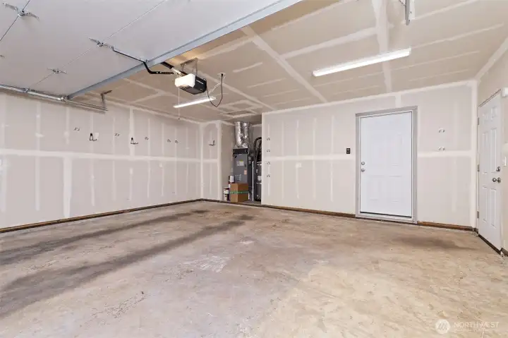 Really nice sheet-rocked garage.