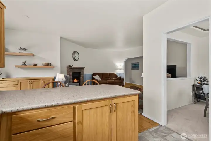 The kitchen is open to the fireside family room.