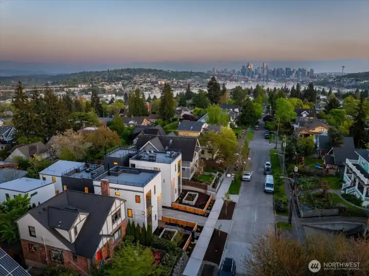 Well-located with awe-inspiring views from the rooftop deck. The Cascades, Olympics, Space Needle & Seattle cityscape, as well as the peek of Rainier are visible on a clear day.