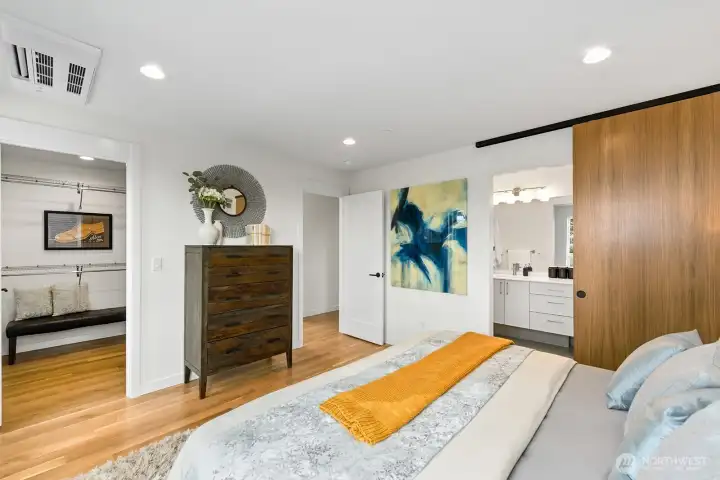 Showing both the walk-in closet and en suite bathroom.