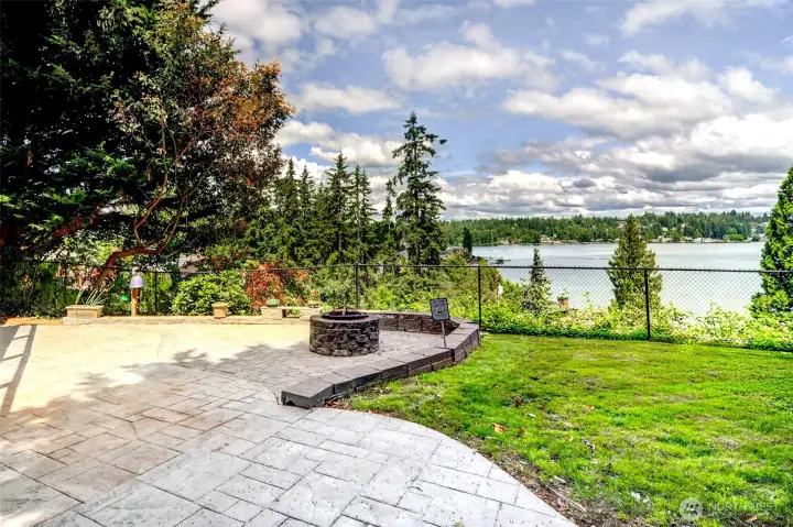 private back yard with mountain and lake views