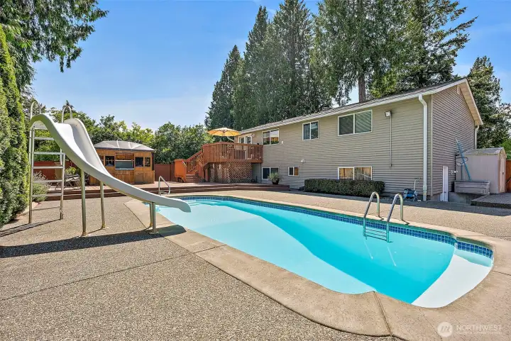 Experience resort-style living featuring an incredible private backyard retreat. Enjoy summer days by the in-ground pool, unwind in the hot tub beneath the gazebo, and entertain with ease in the beautifully designed outdoor spaces.