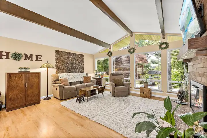 Vaulted ceilings and large windows allow this room to be filled with natural lighting.