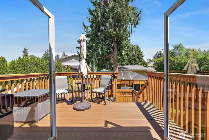 Love this view of the deck overlooking the backyard oasis.