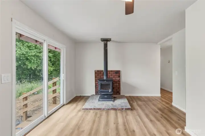 Wood stove in the kitchen area. Wood stove in the kitchen area.