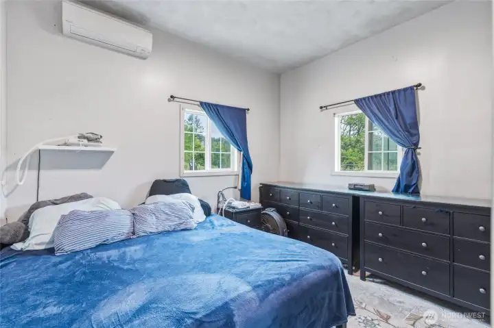 Room in converted garage is currently being used as a bedroom. Room in converted garage is currently being used as a bedroom.