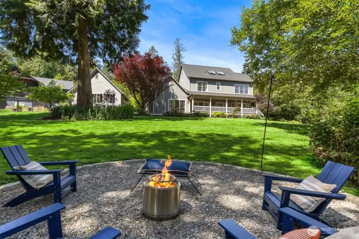 Bottom of the yard looking up to the house from the firepit.
