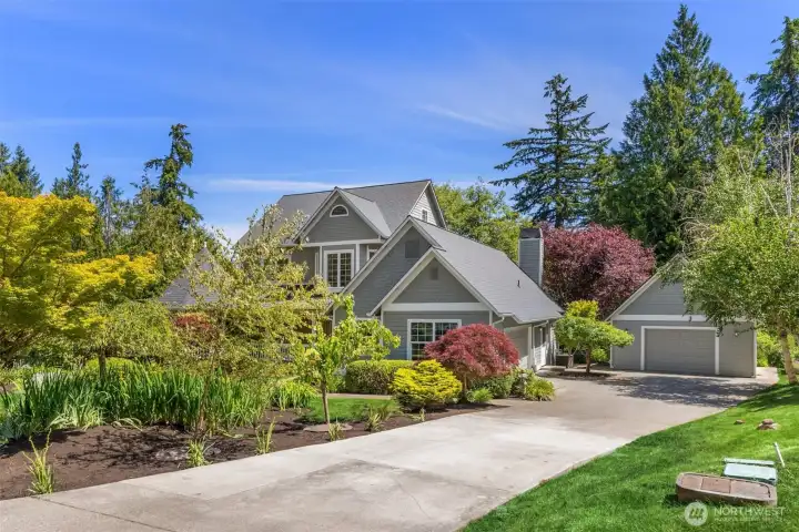 Gorgeous victorian styled home with attached 2 car garage and a detached single car garage/studio.
