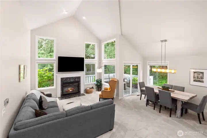 Enormous windows and brand-new skylights bring in all the light, while affording constant views of the nature surrounding the home. Enormous windows and brand-new skylights bring in all the light, while affording constant views of the nature surrounding the home.