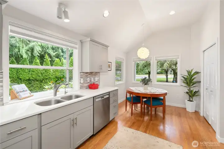 The kitchen is bright, The cozy breakfast nook surrounded by windows create a great space to gather. The kitchen is bright, The cozy breakfast nook surrounded by windows create a great space to gather.