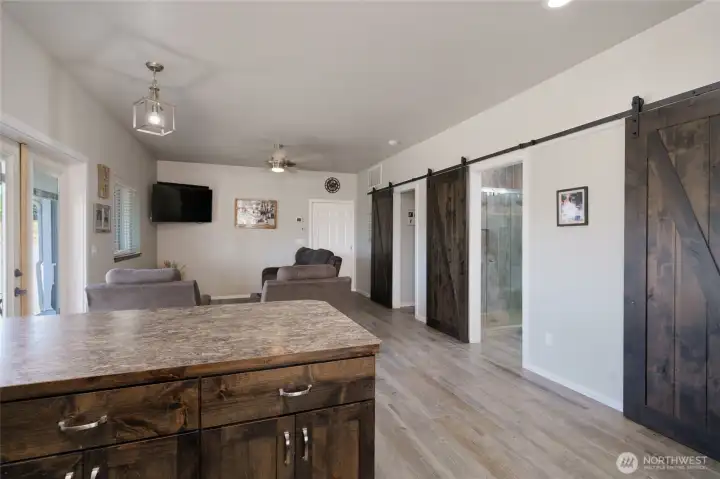 Kitchen is open to living room with bedrooms and bath to the right. Kitchen is open to living room with bedrooms and bath to the right.