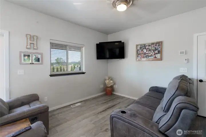 View of the living room. Home is heated and cooled by energy efficient heat pump & furnace combo. View of the living room. Home is heated and cooled by energy efficient heat pump & furnace combo.