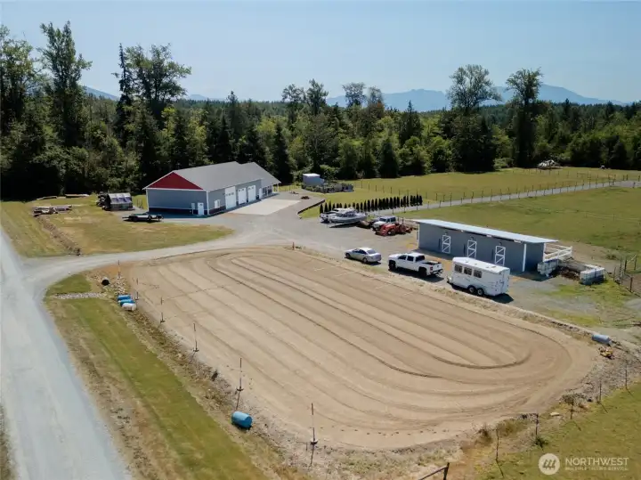 Drone view of approximately 80'x100' outdoor arena. Drone view of approximately 80'x100' outdoor arena.