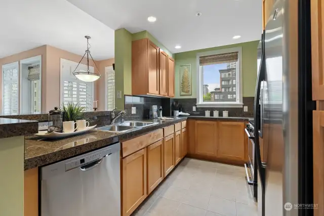 This fabulous kitchen is complete with a new dishwasher, ample storage space and gas cooking!