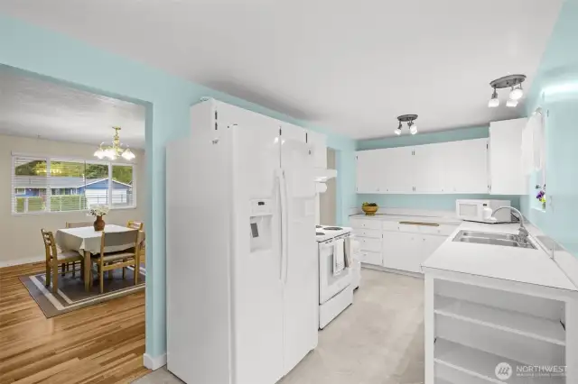 Kitchen and living room in the background