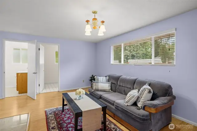 Family room, showing doors to the halff bath and laudry room