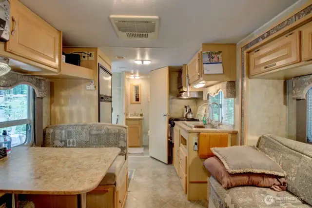 Dining and kitchen with all necessities *Trailer potentially included in sale