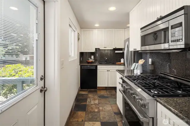 Step out from the kitchen to the large entertaining sized deck.