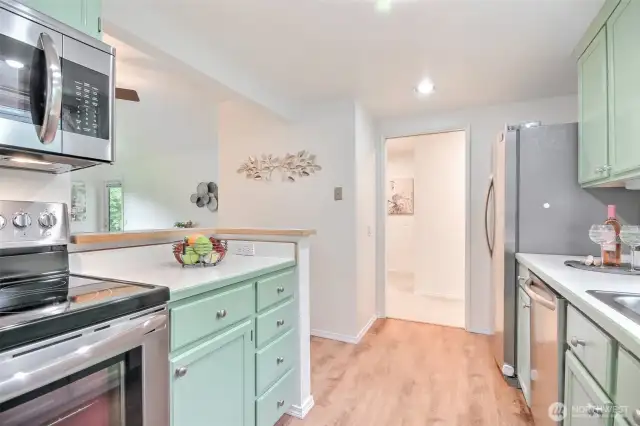 Charming kitchen with stainless appliances