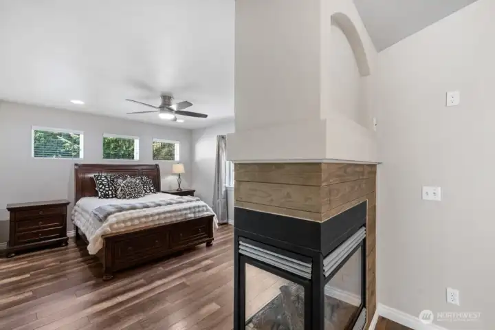 Primary suite has double sided-fireplace