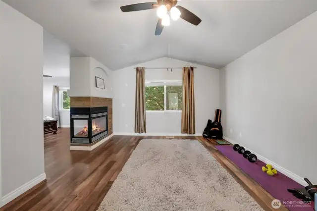 Primary has cozy 2-sided fireplace