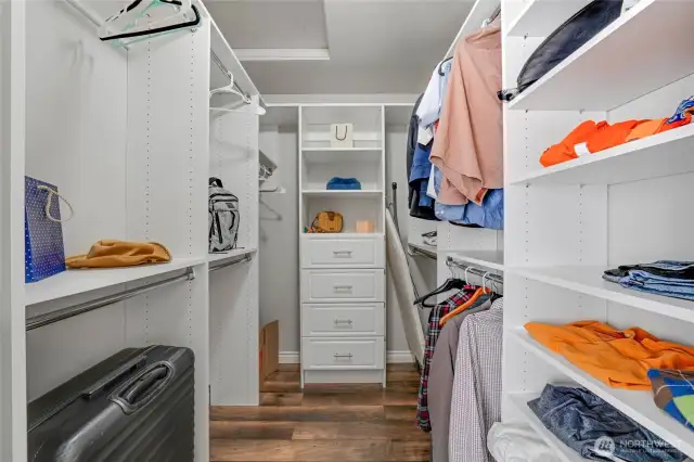 Primary closet has custom organization