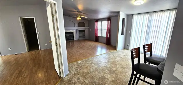 Dining in front of sliding doors to deck