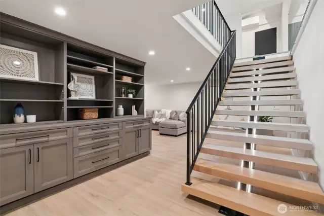 Floating staircase to lower level.