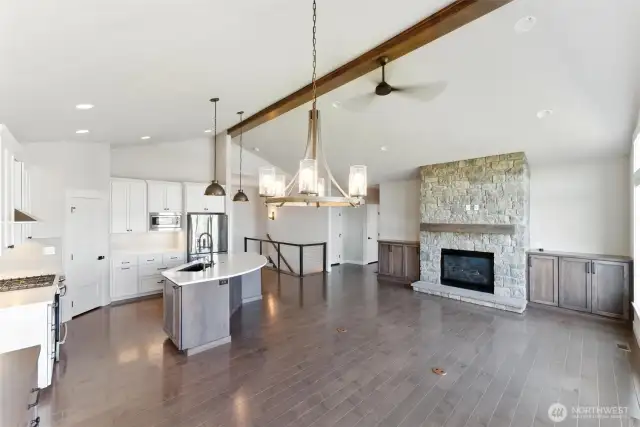 Living area with northern exposure, large bay windows letting in lots of natural light but without the heat of direct sunlight